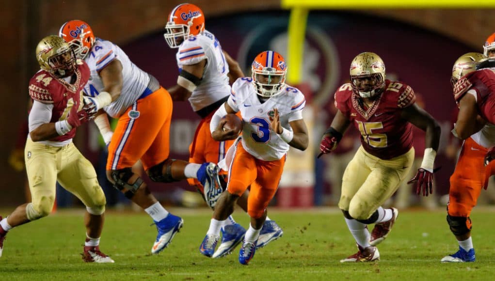 Florida Gators quarterback Treon Harris carries the ball against the Florida Stat Seminoles at Doak Campbell Stadium- Florida Gators football- 1280x852