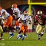 Florida Gators quarterback Treon Harris carries the ball against the Florida Stat Seminoles at Doak Campbell Stadium- Florida Gators football- 1280x852