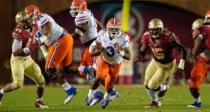Florida Gators quarterback Treon Harris carries the ball against the Florida Stat Seminoles at Doak Campbell Stadium- Florida Gators football- 1280x852