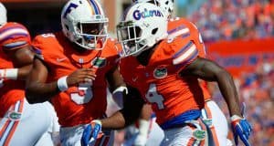 University of Florida quarterback Treon Harris celebrates with receiver Brandon Powell during the Florida Gators game against Vanderbilt- Florida Gators football- 1280x852