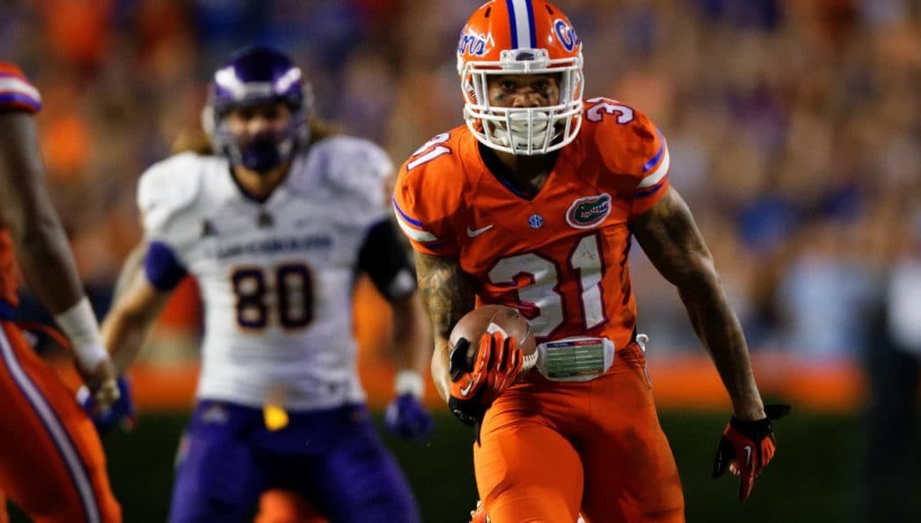 Florida Gators cornerback Jalen Tabor returns an interception for a touchdown against ECU- Florida Gators football- 1280x852