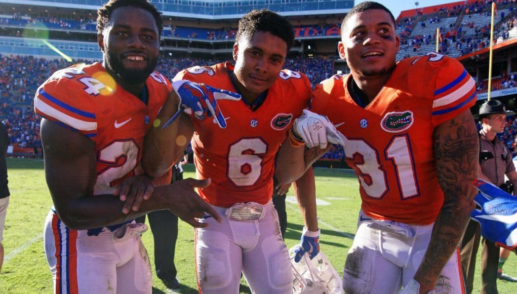 Florida Gators defensive backs Brian Poole, Quincy Wilson and Jalen Tabor celebrate Florida's win over the Vanderbilt Commodores- Florida Gators football- 1280x854