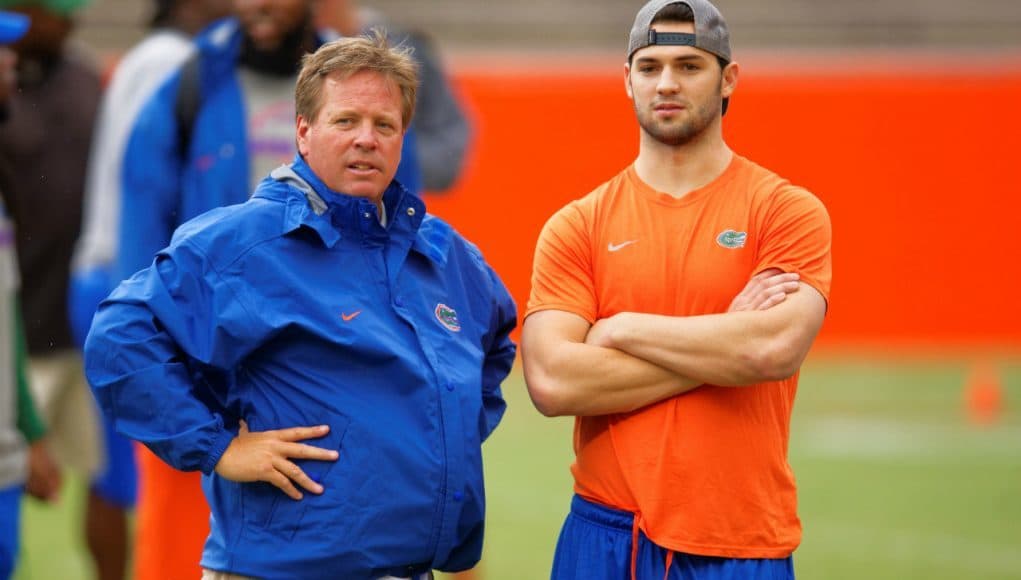 Florida Gators head coach Jim McElwain and redshirt freshman quarterback Will Grier watch high school athletes work out during Friday Night Lights- Florida Gators football- 1280x854