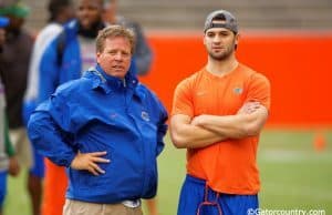 Florida Gators head coach Jim McElwain and redshirt freshman quarterback Will Grier watch high school athletes work out during Friday Night Lights- Florida Gators football- 1280x854