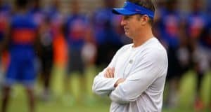 Florida Gators offensive coordinator Doug Nussmeier watches prospects work out during Friday Night Lights- Florida Gators football- 1280x854