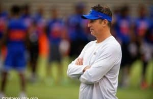 Florida Gators offensive coordinator Doug Nussmeier watches prospects work out during Friday Night Lights- Florida Gators football- 1280x854