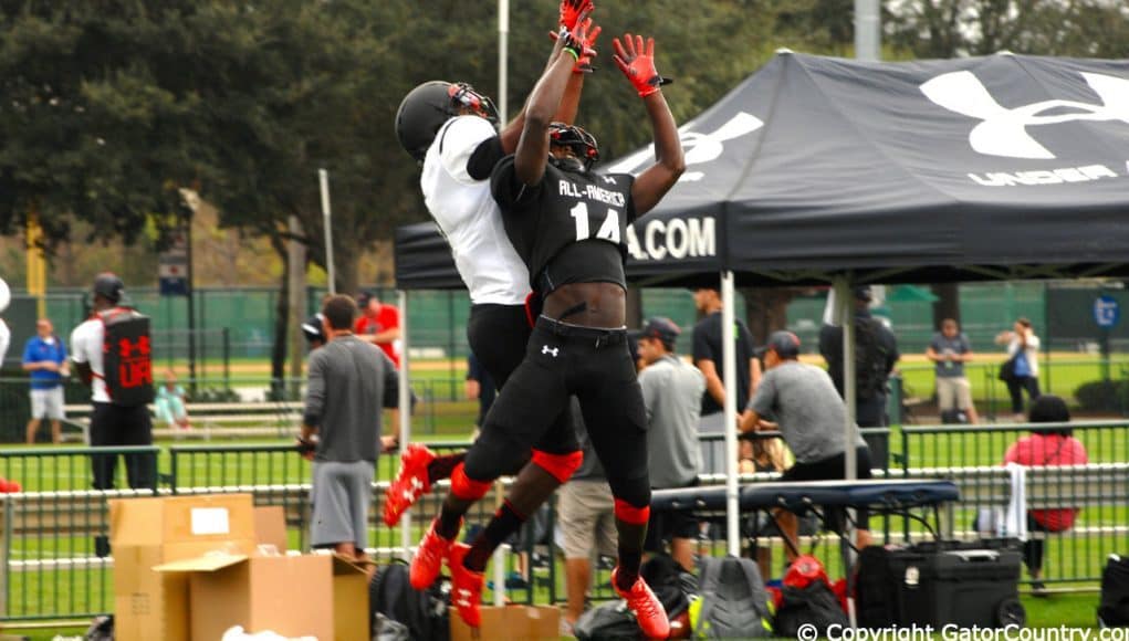 Florida Gators Wide Receiver Commit Josh Hammond Goes Up For Pass Over Gators Recruit JayVaughn Myers At Tuesday Practice of Under Armour All-American Game