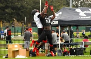 Florida Gators Wide Receiver Commit Josh Hammond Goes Up For Pass Over Gators Recruit JayVaughn Myers At Tuesday Practice of Under Armour All-American Game