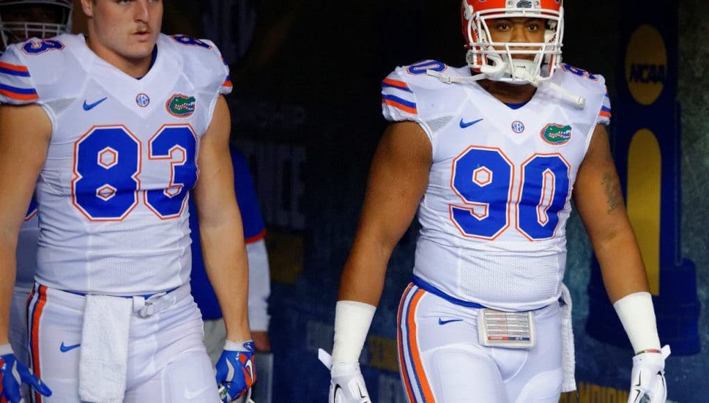 Seniors Jake McGee and Jon Bullard walk on to the field for the 2015 SEC Championship game- Florida Gators football- 1280x852