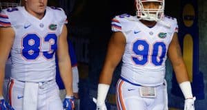Seniors Jake McGee and Jon Bullard walk on to the field for the 2015 SEC Championship game- Florida Gators football- 1280x852