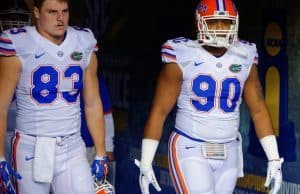 Seniors Jake McGee and Jon Bullard walk on to the field for the 2015 SEC Championship game- Florida Gators football- 1280x852