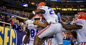 The Florida Gators celebrate Antonio Callaway's 85-yard punt return for a touchdown in the SEC Championship Game- Florida Gators football- 1280x852