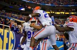 The Florida Gators celebrate Antonio Callaway's 85-yard punt return for a touchdown in the SEC Championship Game- Florida Gators football- 1280x852