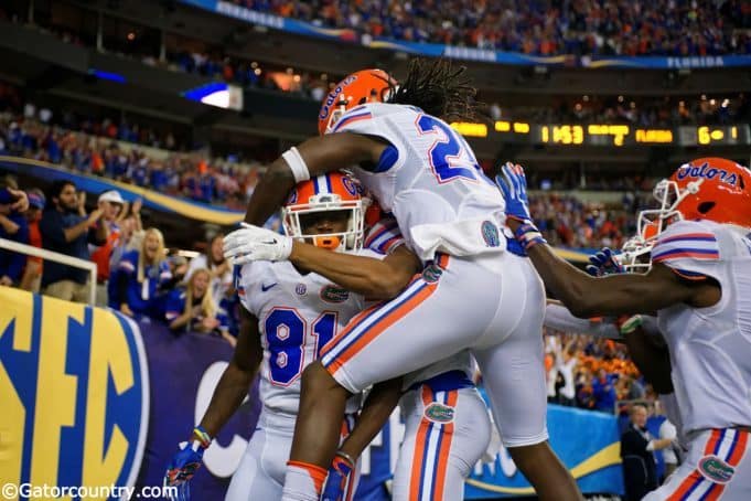 The Florida Gators celebrate Antonio Callaway's 85-yard punt return for a touchdown in the SEC Championship Game- Florida Gators football- 1280x852