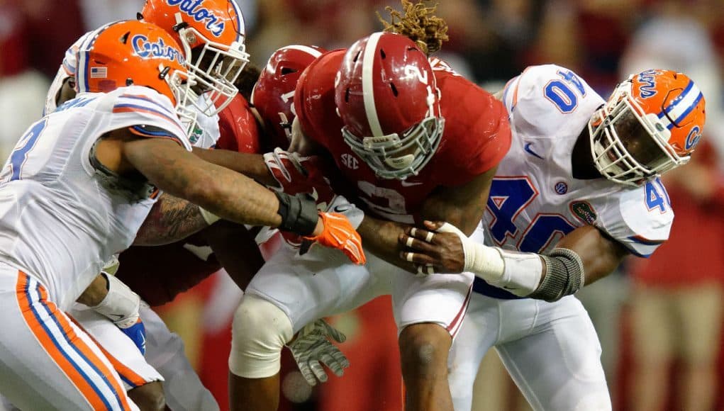 Three Florida Gators combine to bring down Alabama Crimson Tide running back Derrick Henry- Florida Gators football- 1280x852