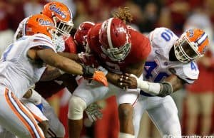 Three Florida Gators combine to bring down Alabama Crimson Tide running back Derrick Henry- Florida Gators football- 1280x852