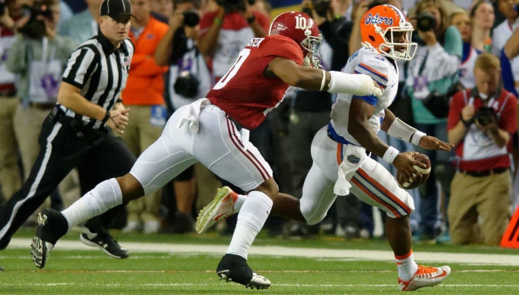 University of Florida quarterback Treon Harris runs from Alabama linebacker Reuben Foster- Florida Gators football- 1280x852