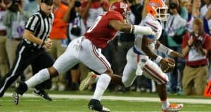 University of Florida quarterback Treon Harris runs from Alabama linebacker Reuben Foster- Florida Gators football- 1280x852