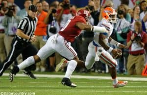 University of Florida quarterback Treon Harris runs from Alabama linebacker Reuben Foster- Florida Gators football- 1280x852