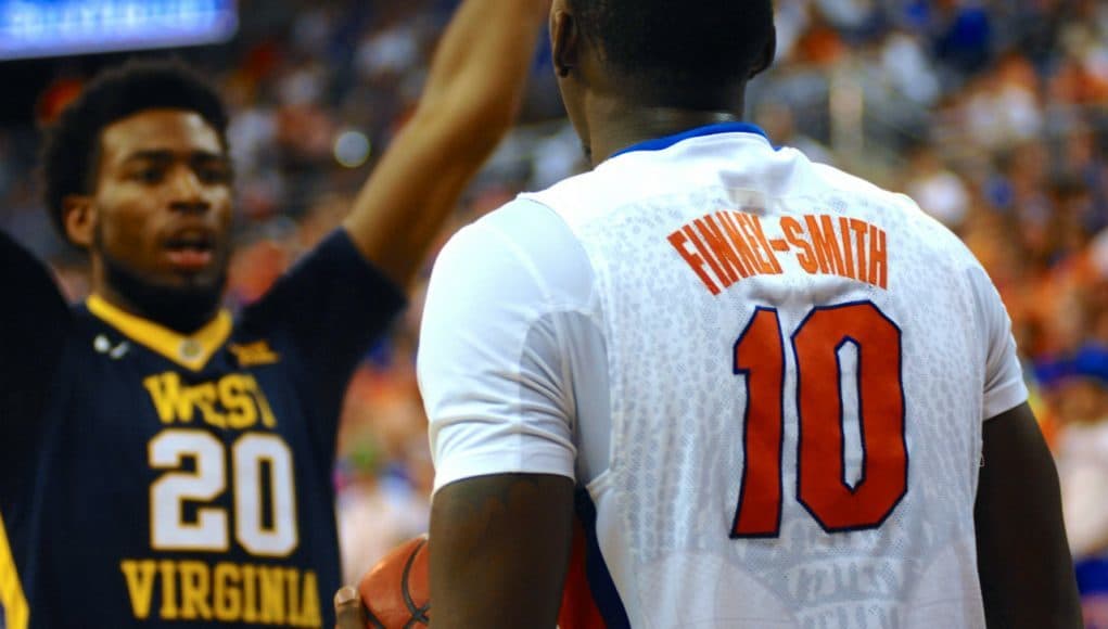 Dorian Finney-Smith looks to inbounds the ball versus West Virginia-Florida Gators Basketball-January 30,2016-GatorCountry.com