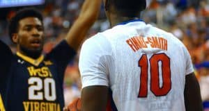 Dorian Finney-Smith looks to inbounds the ball versus West Virginia-Florida Gators Basketball-January 30,2016-GatorCountry.com