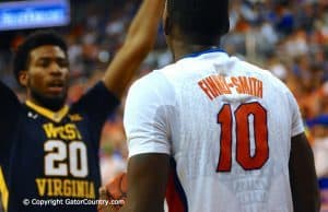 Dorian Finney-Smith looks to inbounds the ball versus West Virginia-Florida Gators Basketball-January 30,2016-GatorCountry.com