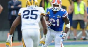 Florida Gators junior running back Kelvin Taylor carries the ball against the Michigan Wolverines in the 2016 Citrus Bowl- Florida Gators football- 1280x852