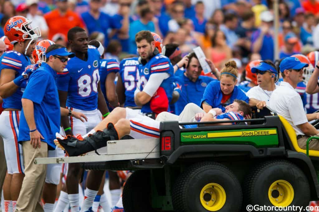 Florida Gators tight end Jake McGee is carted off of the field after breaking his leg against Eastern Michigan in 2014- Florida Gators football- 1280x850