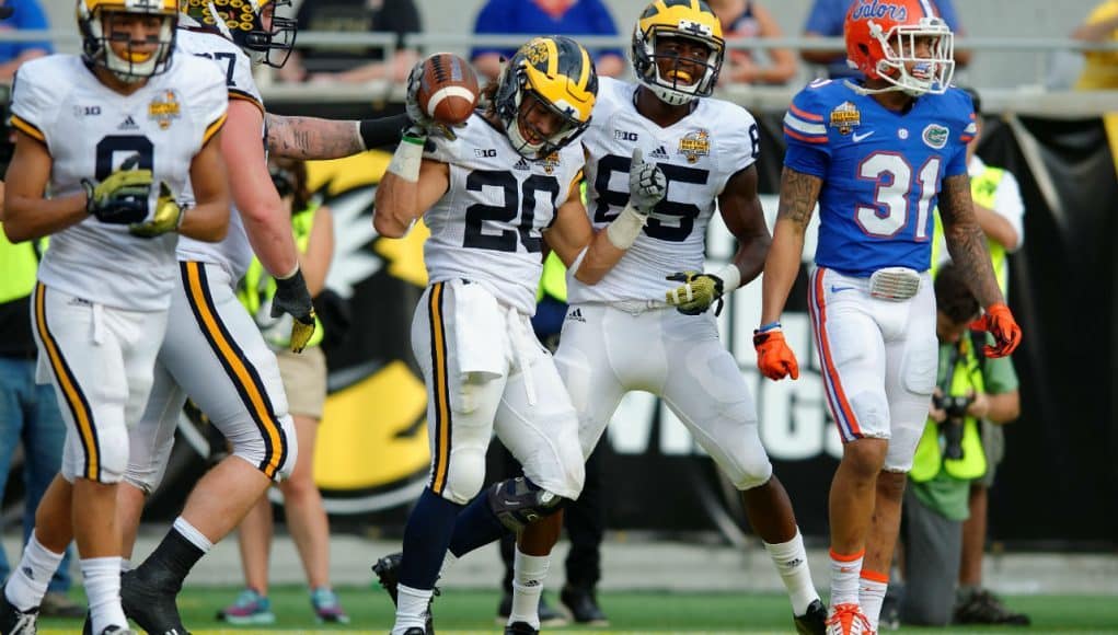 Michigan running back Drake Johnson celebrates a touchdown in Michigan's 41-7 win over the Florida Gators- Florida Gators football- 1280x852