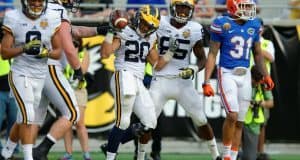 Michigan running back Drake Johnson celebrates a touchdown in Michigan's 41-7 win over the Florida Gators- Florida Gators football- 1280x852