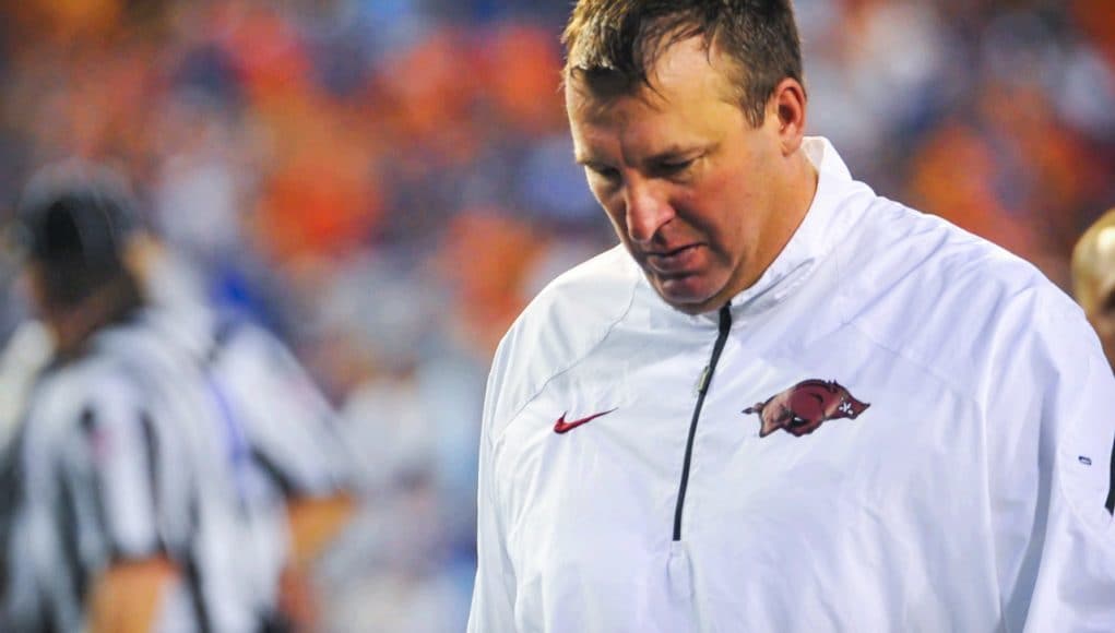 Arkansas Razorbacks head coach Bret Bielema walks off the field after a 2013 loss to the Florida Gators football team- Florida Gators football- 1280x850