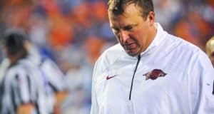 Arkansas Razorbacks head coach Bret Bielema walks off the field after a 2013 loss to the Florida Gators football team- Florida Gators football- 1280x850