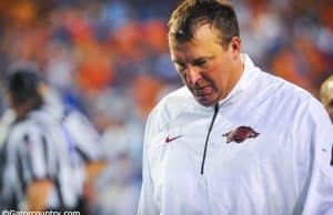 Arkansas Razorbacks head coach Bret Bielema walks off the field after a 2013 loss to the Florida Gators football team- Florida Gators football- 1280x850