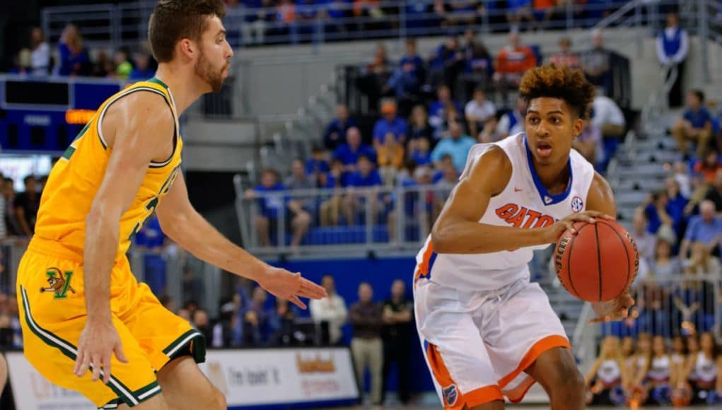 Florida Gator sophomore forward Devin Robinson dribbles in a win over Vermont- Florida Gators basketball- 1280x852