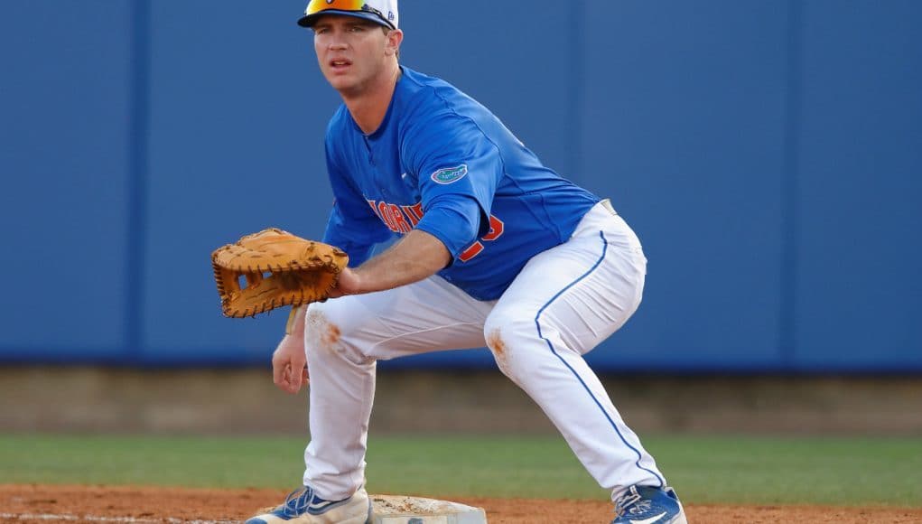 Florida Gators first baseman Peter Alonso gets set at first base in a win against Florida Gulf Coast University to start the season 2-0- Florida Gators baseball- 1280x852