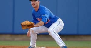 Florida Gators first baseman Peter Alonso gets set at first base in a win against Florida Gulf Coast University to start the season 2-0- Florida Gators baseball- 1280x852
