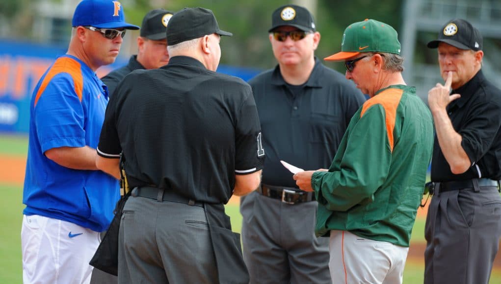 Florida Gators head baseball coach Kevin o'Sullivan meets with Miami Hurricanes head coach Jim Morris before the Canes and Gators game in 2015- Florida Gators baseball- 1280x852