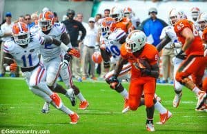 Florida Gators linebacker Neiron Ball pursues Miami Hurricanes running back Duke Johnson in a loss to Miami- Florida Gators football- 1280x849