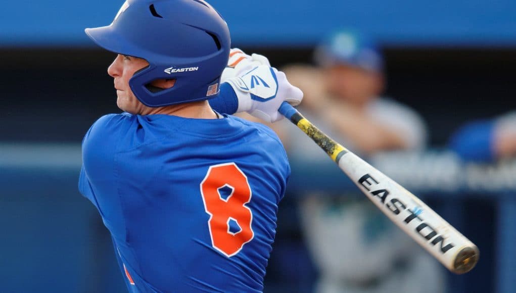 Florida Gators second baseman Deacon Liput singles in a win against Florida Gulf Coast University to start the season 2-0. February 20th, 2015- Florida Gators baseball- 1280x851