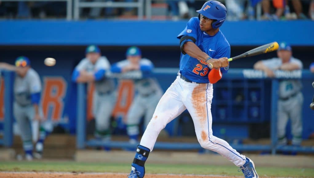 Florida Gators outfielder Buddy Reed batting in a win against Florida Gulf Coast University to start the season 2-0. February 20th, 2015- Florida Gators baseball- 1280x852