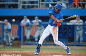 Florida Gators outfielder Buddy Reed batting in a win against Florida Gulf Coast University to start the season 2-0. February 20th, 2015- Florida Gators baseball- 1280x852