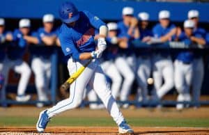 Florida Gators third baseman Jonathan India hitting in a win against Florida Gulf Coast University to start the season 2-0. February 20th, 2015- Florida Gators baseball- 1280x852