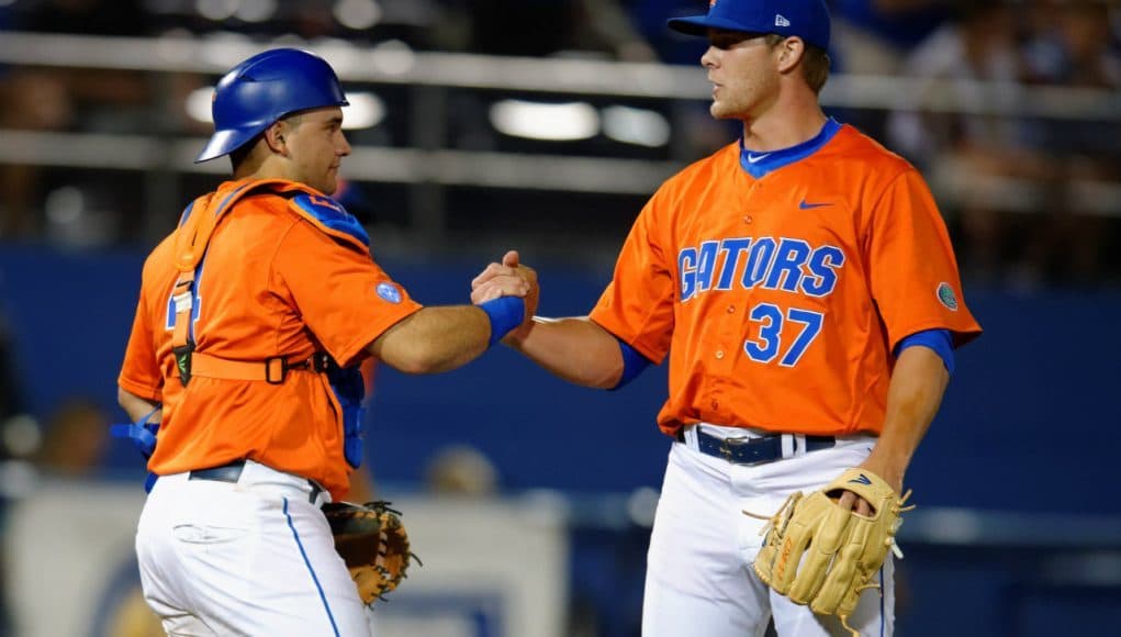 University of Florida Cather Mike Rivera congratulates Shaun Anderson following the Florida Gators 6-0 win over Florida State- Florida Gators baseball- 1280x852