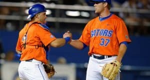 University of Florida Cather Mike Rivera congratulates Shaun Anderson following the Florida Gators 6-0 win over Florida State- Florida Gators baseball- 1280x852