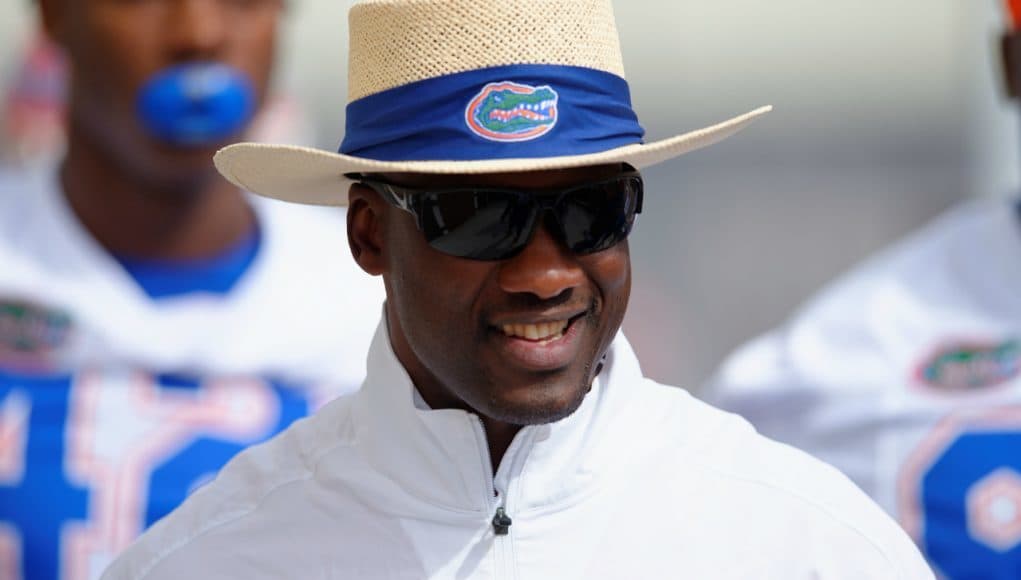 University of Florida defensive backs coach Torrian Gray walks out with the team for spring practice- Florida Gators football- 1280x852