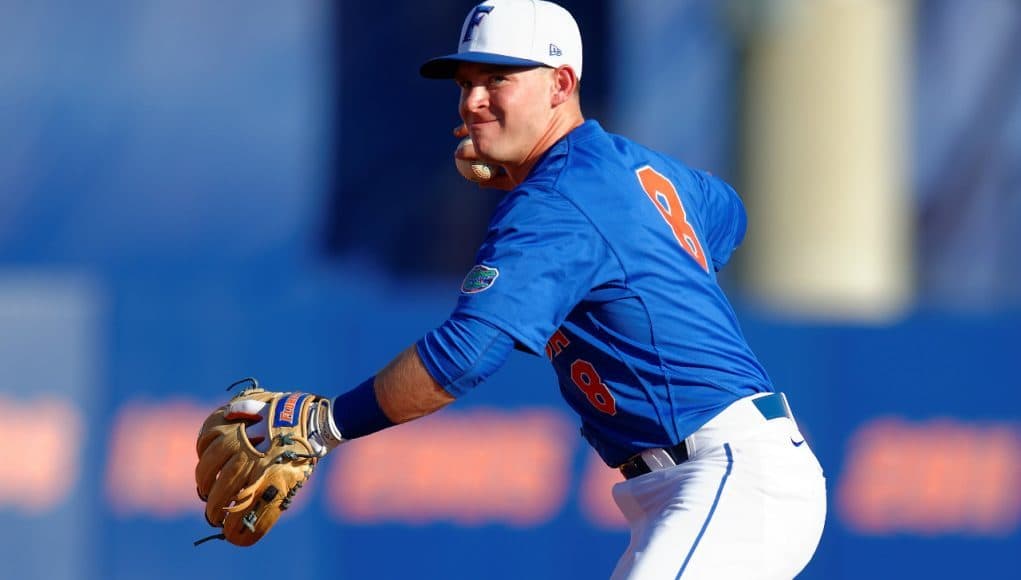 University of Florida freshman infielder Deacon Liput makes a play to first base in a win against Florida Gulf Coast- Florida Gators baseball- 1280x852