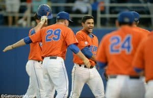 University of Florida freshman outfielder Nelson Maldonado is greeted by teammates after his home run against FSU- Florida Gators baseball-1280x852