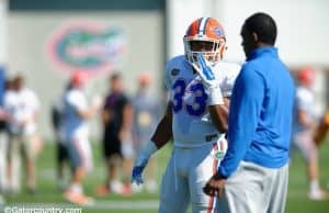 University of Florida linebackers coach Randy Shannon and freshman linebacker David Reese during the Florida Gators 2016 spring football camp- Florida Gators football- 1280x852