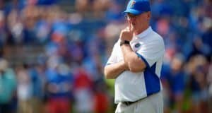 University of Florida offensive line coach Mike Summers watches his group warm up before playing Tennessee in 2015- Florida Gators football- 1280x852