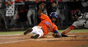 Buddy Reed slides around the tag and successfully steals home against Georgia on Friday, April 22 - Photo courtesy of Jordan McPherson / The Independent Florida Alligator